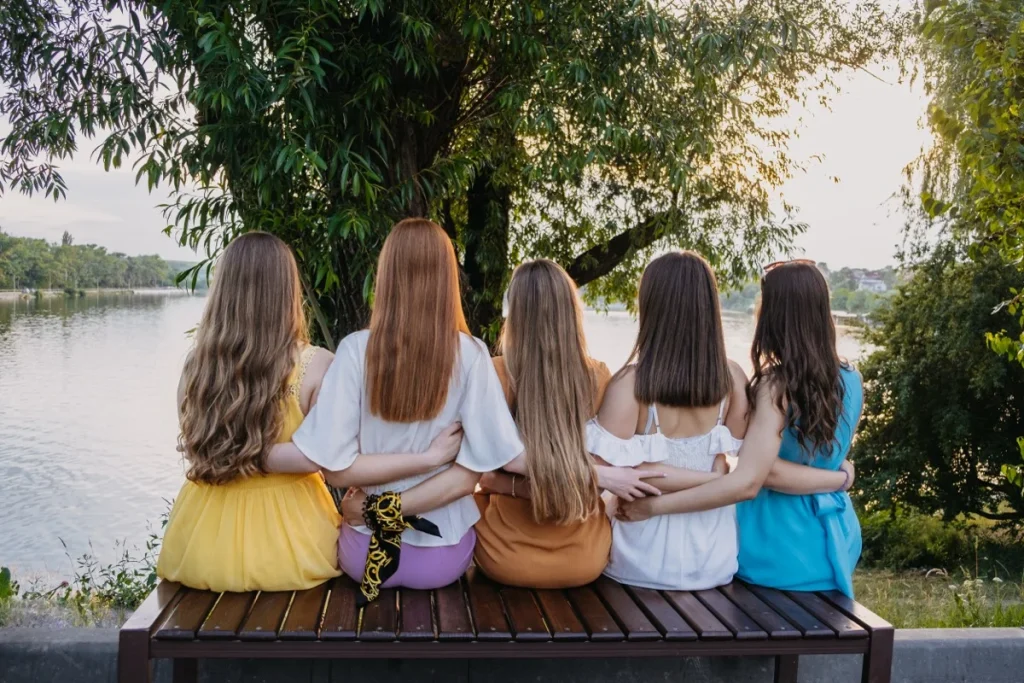 Woman with trendy spring 2026 hairstyle featuring soft layers and dimensional color in Las Vegas