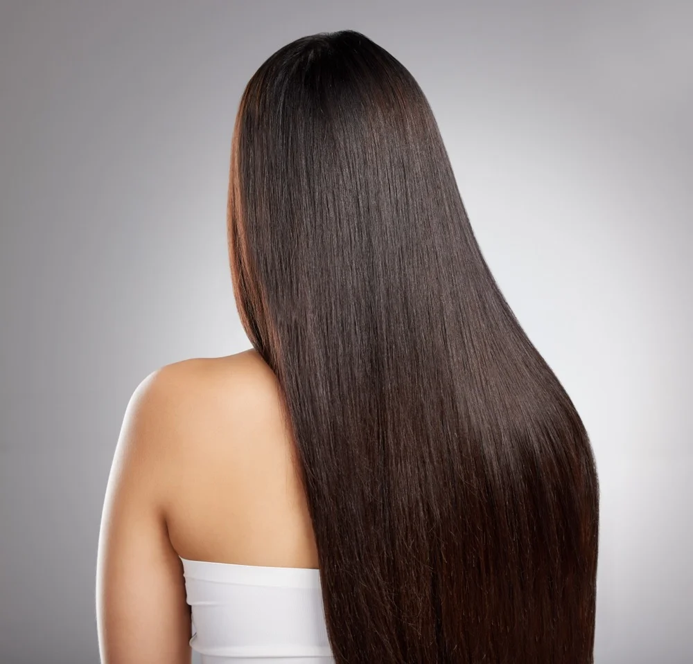 Glossy straight hair results from keratin treatment showing frizz-free sleek texture