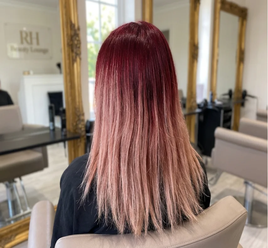 Hair with vibrant color at roots and dull faded ends that need a professional trim at RH Beauty Lounge Las Vegas
